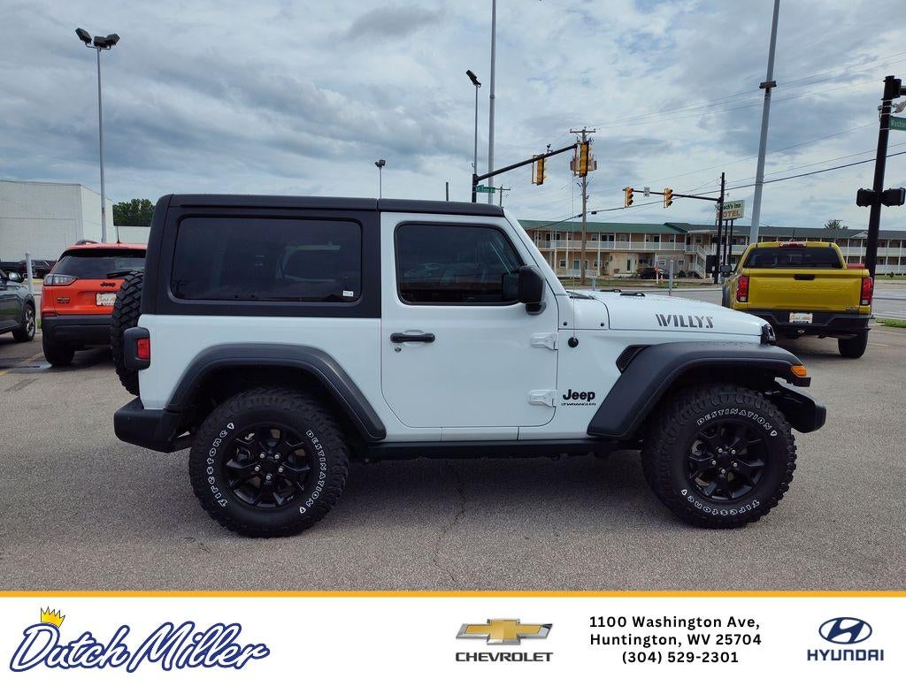 2023 Jeep Wrangler — rear three-quarter view