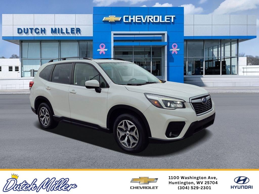 2021 Subaru Forester Premium in Crystal White Pearl — front three-quarter view